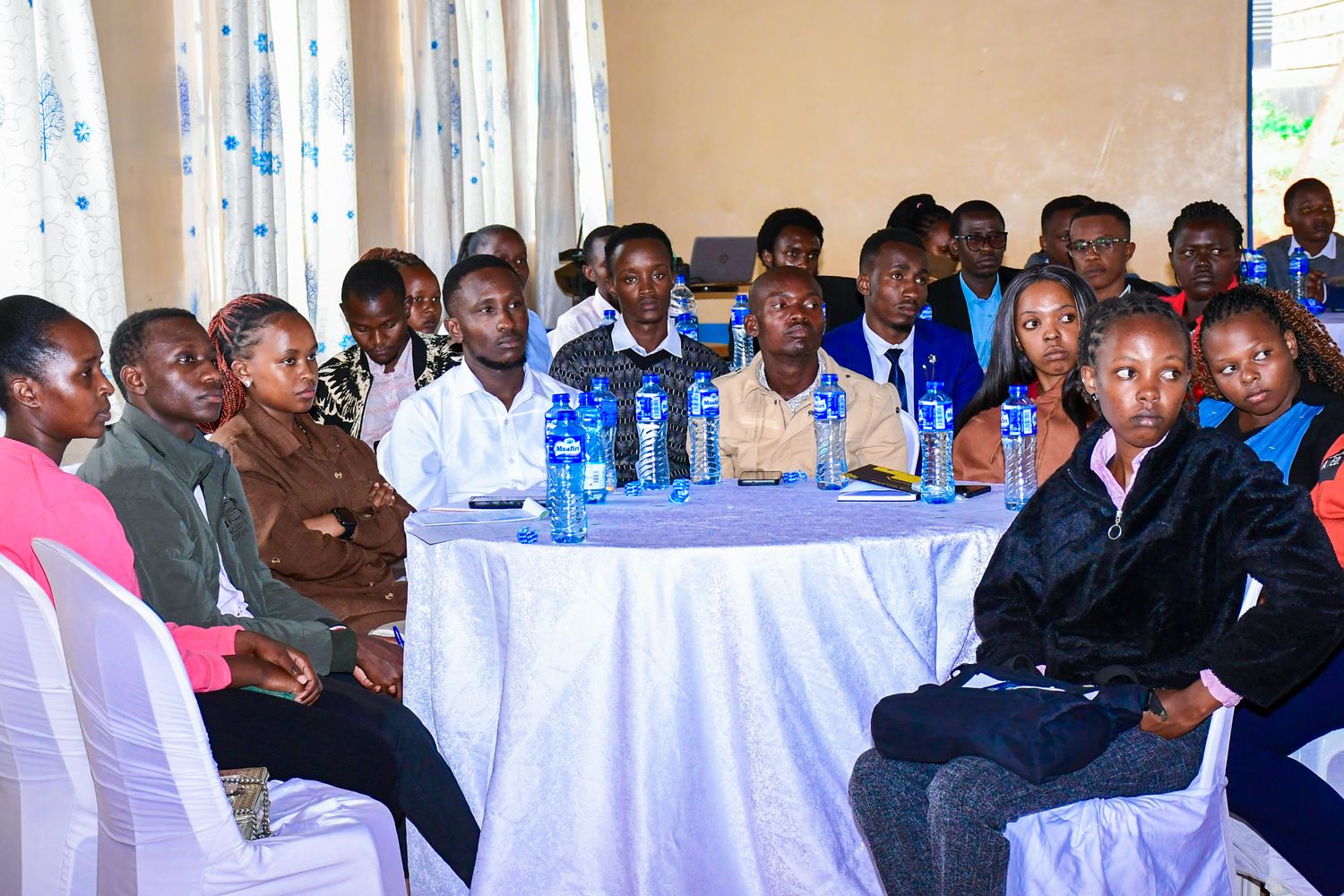 Interns cohort following proceedings during the induction